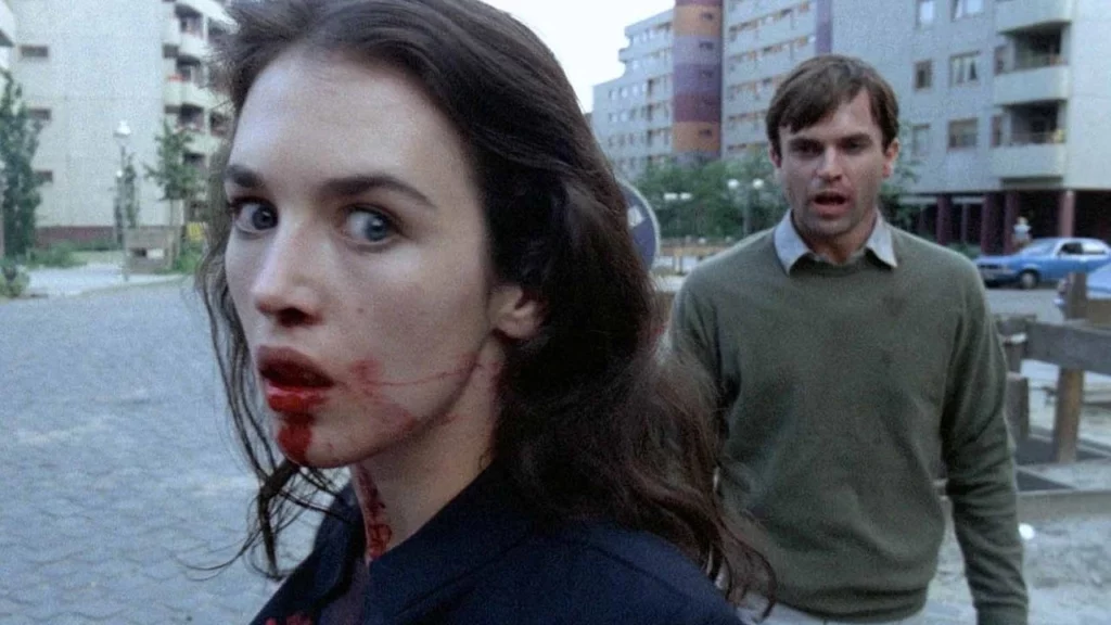 una scena di Possession, tra Migliori film d'amore tossico, con una donna dallo sguardo vacuo in primo piano (640x360)